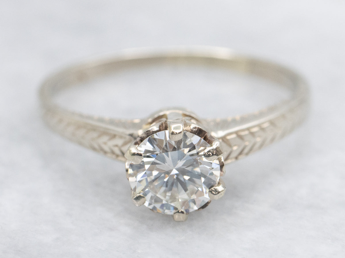 Round Brilliant Diamond Set in Antique Etched Engagement Setting