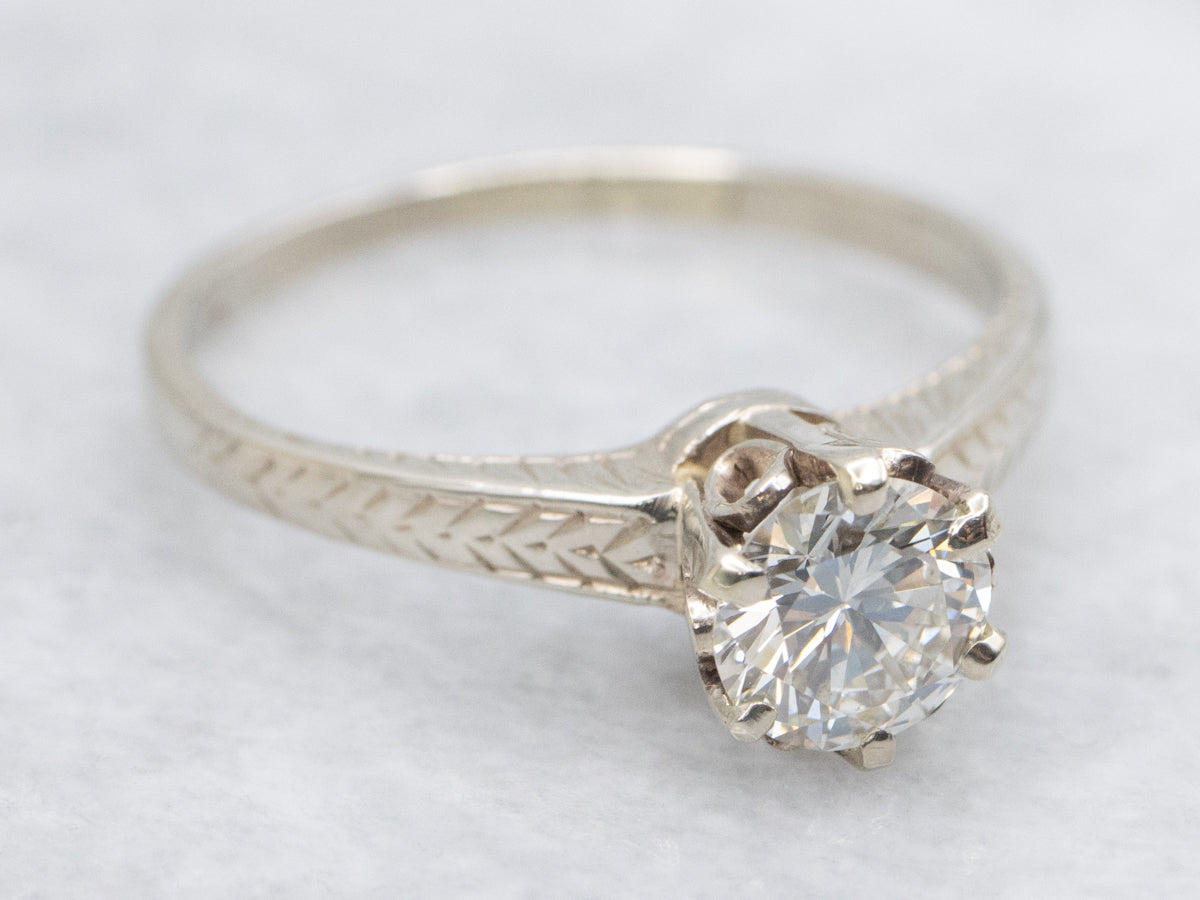 Round Brilliant Diamond Set in Antique Etched Engagement Setting