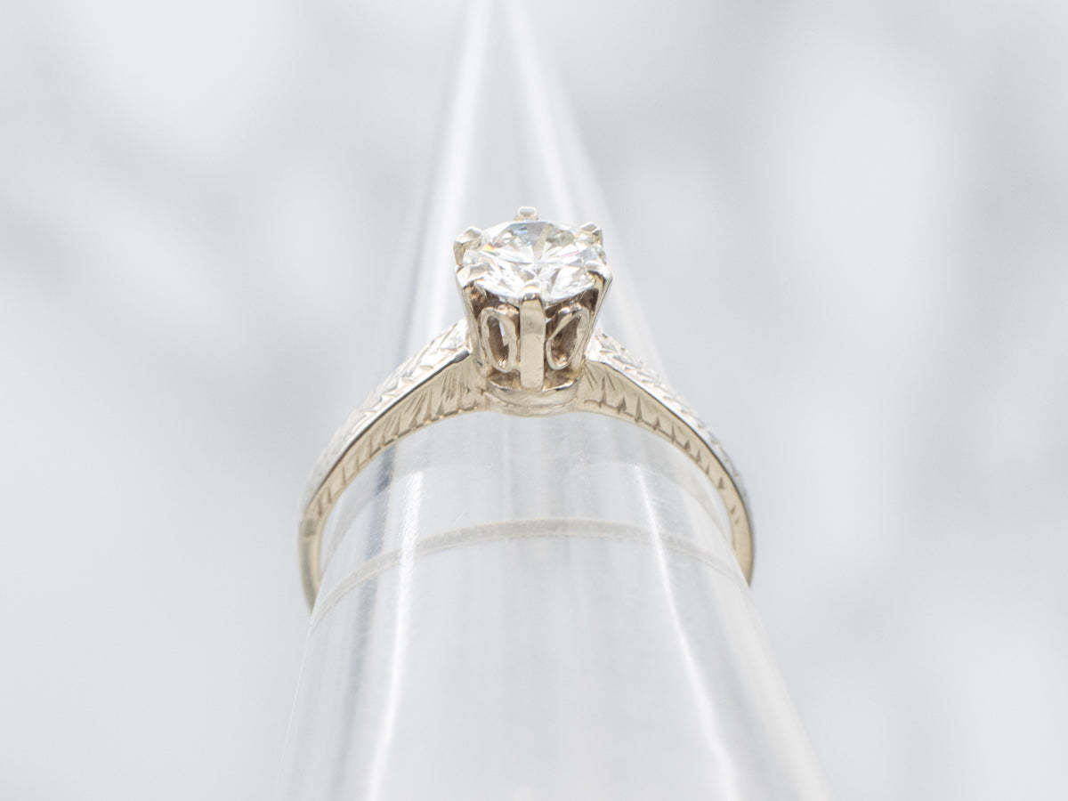 Round Brilliant Diamond Set in Antique Etched Engagement Setting