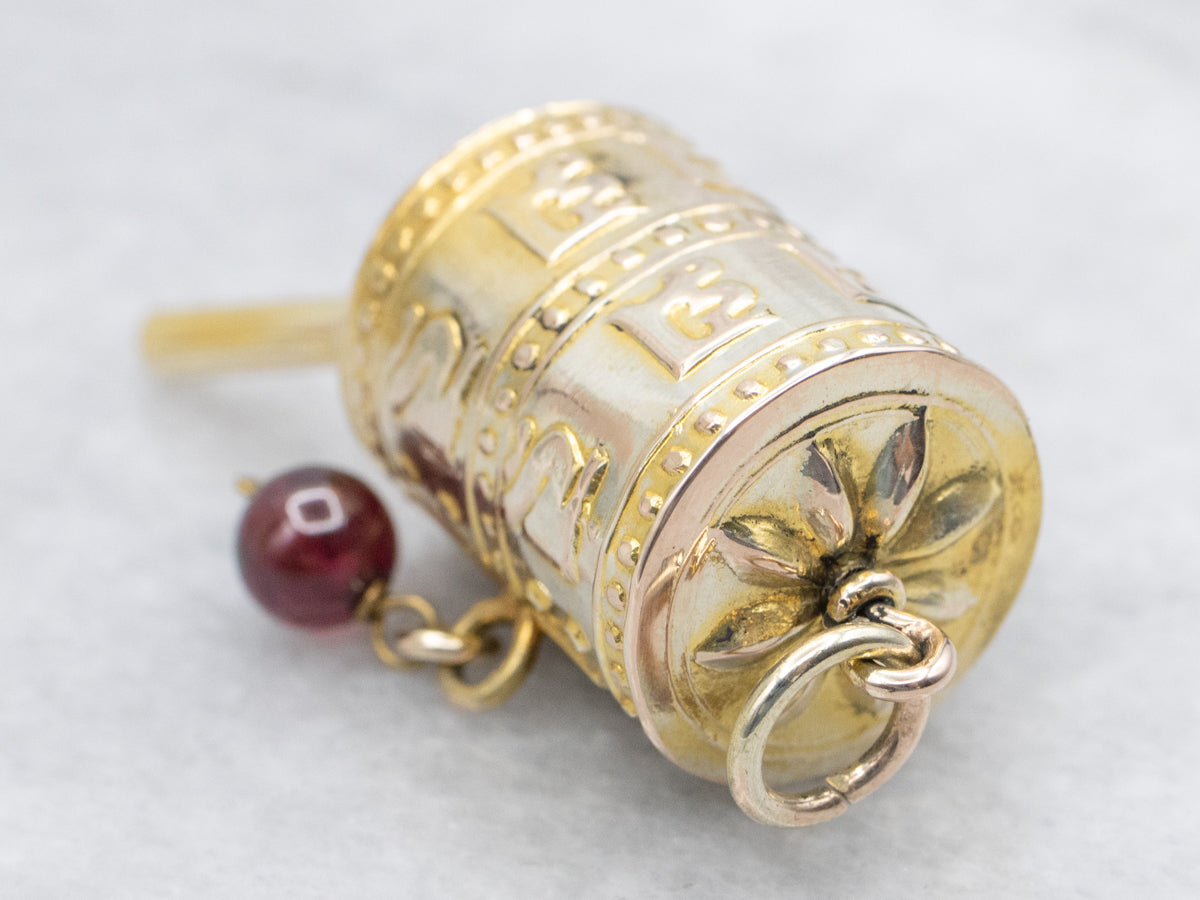 Vintage Gold Tibetan Prayer Wheel Pendant with Garnet