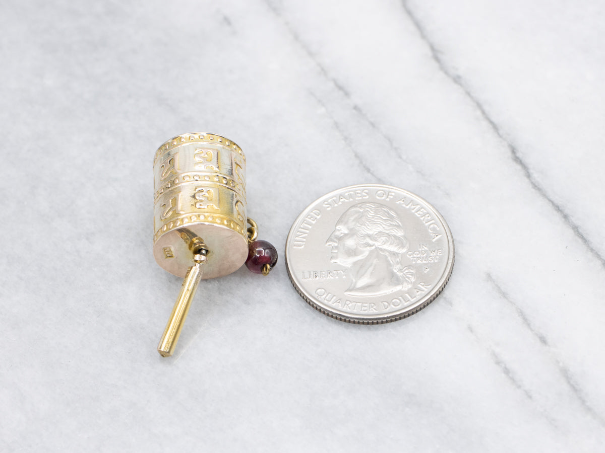 Vintage Gold Tibetan Prayer Wheel Pendant with Garnet