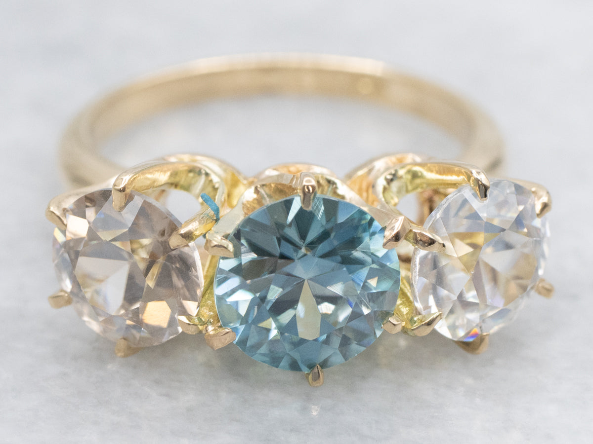 Twinkling Blue and White Zircon Three Stone Ring