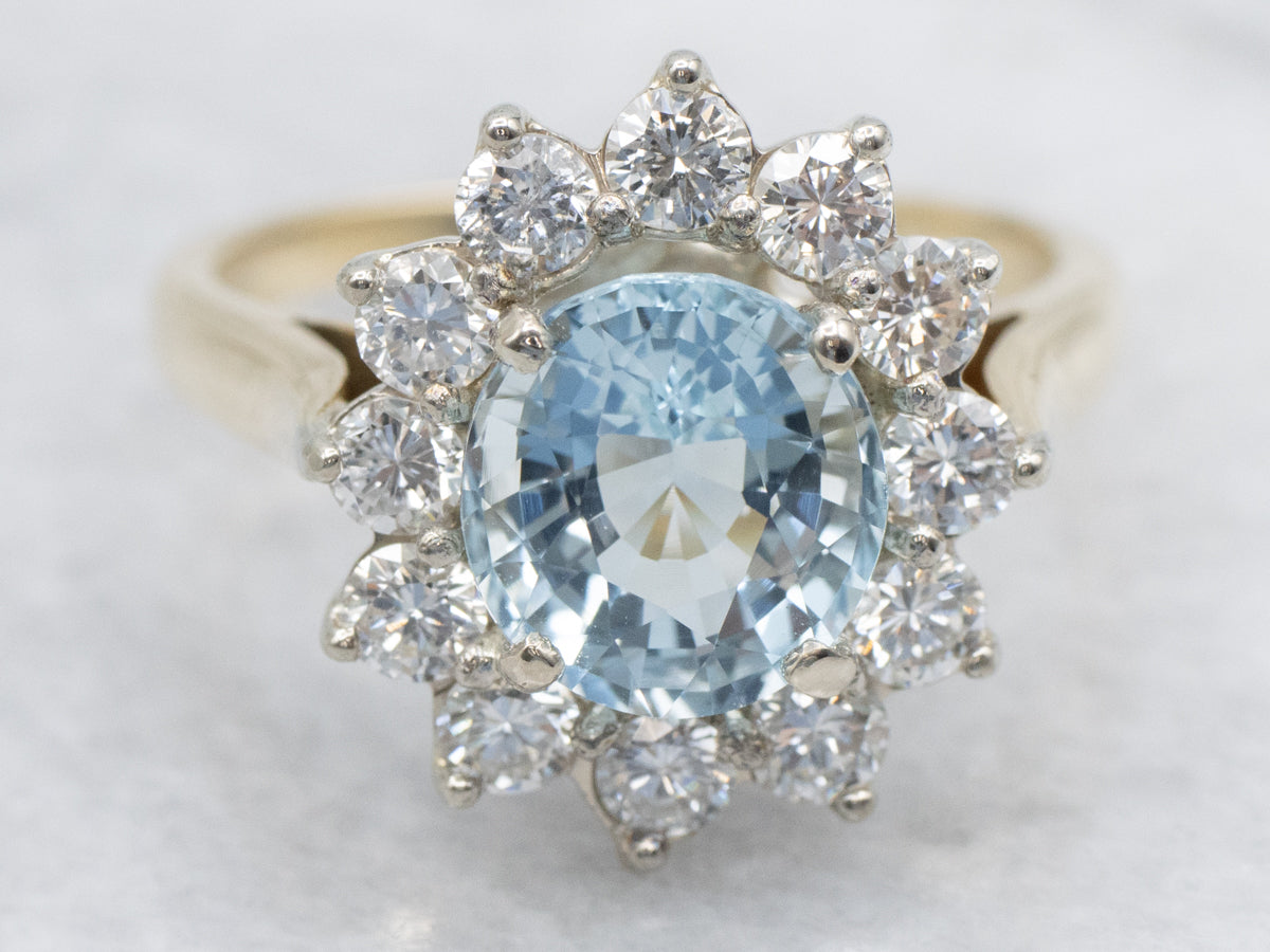 Modern Aquamarine and Diamond Halo Ring