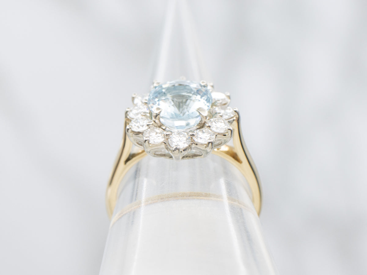 Modern Aquamarine and Diamond Halo Ring