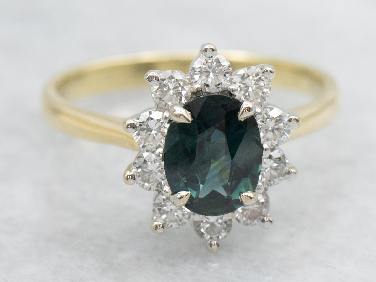 Blue-Green Sapphire and Diamond Halo Engagement Ring