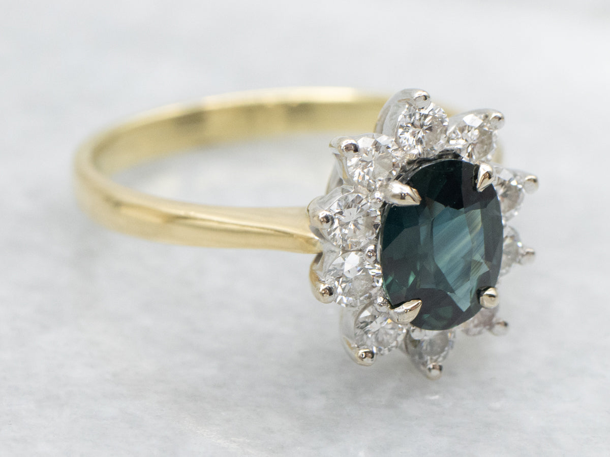 Blue-Green Sapphire and Diamond Halo Engagement Ring