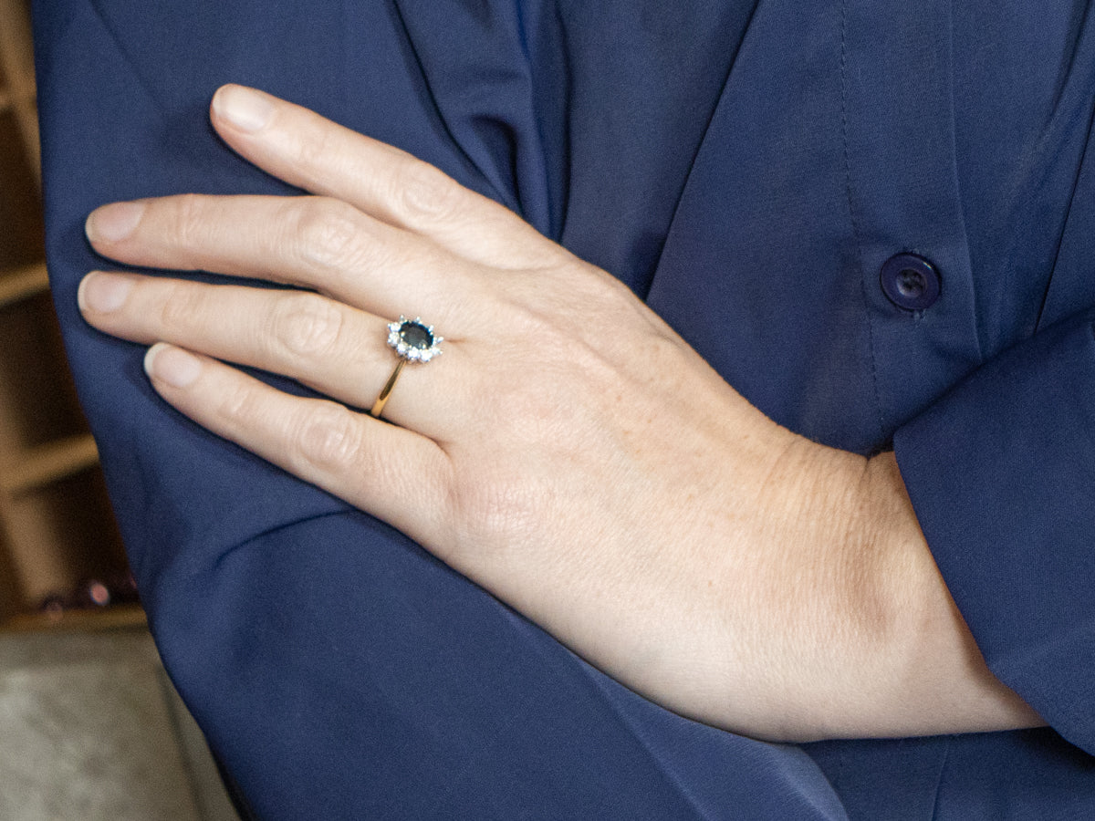 Blue-Green Sapphire and Diamond Halo Engagement Ring