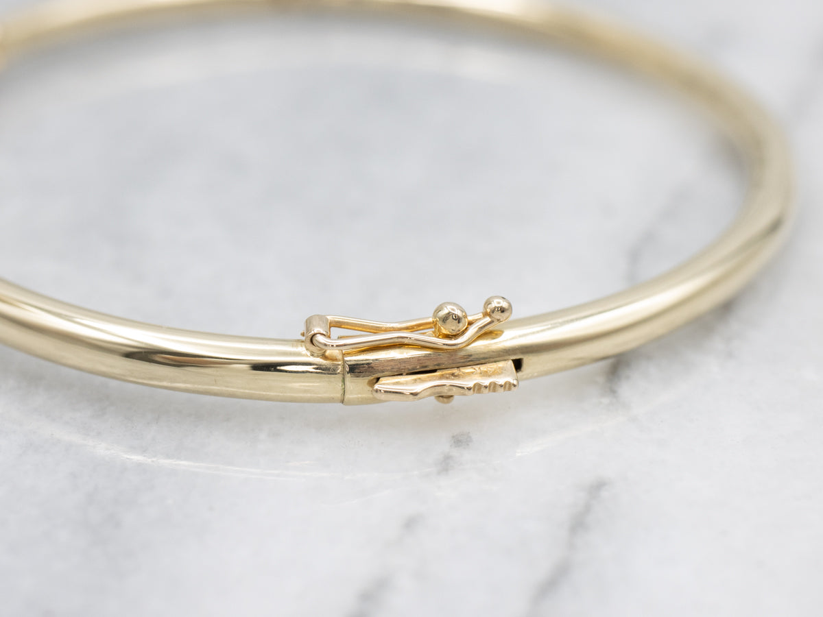 Emerald and Diamond Gold Bangle Bracelet