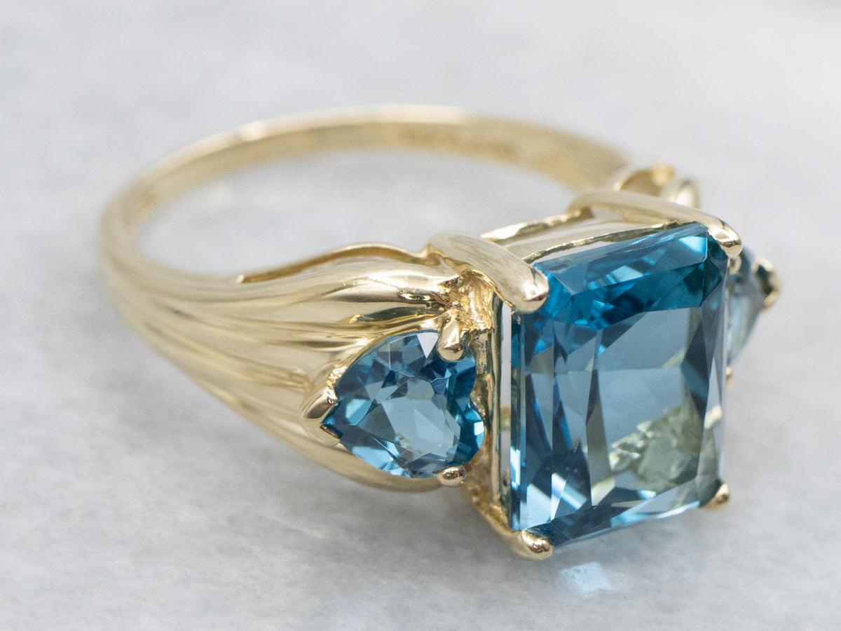 London Blue Topaz and Gold Three Stone Ring