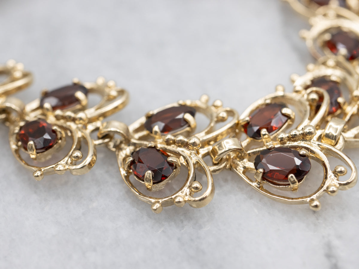 Looping Gold and Garnet Butterfly Link Bracelet