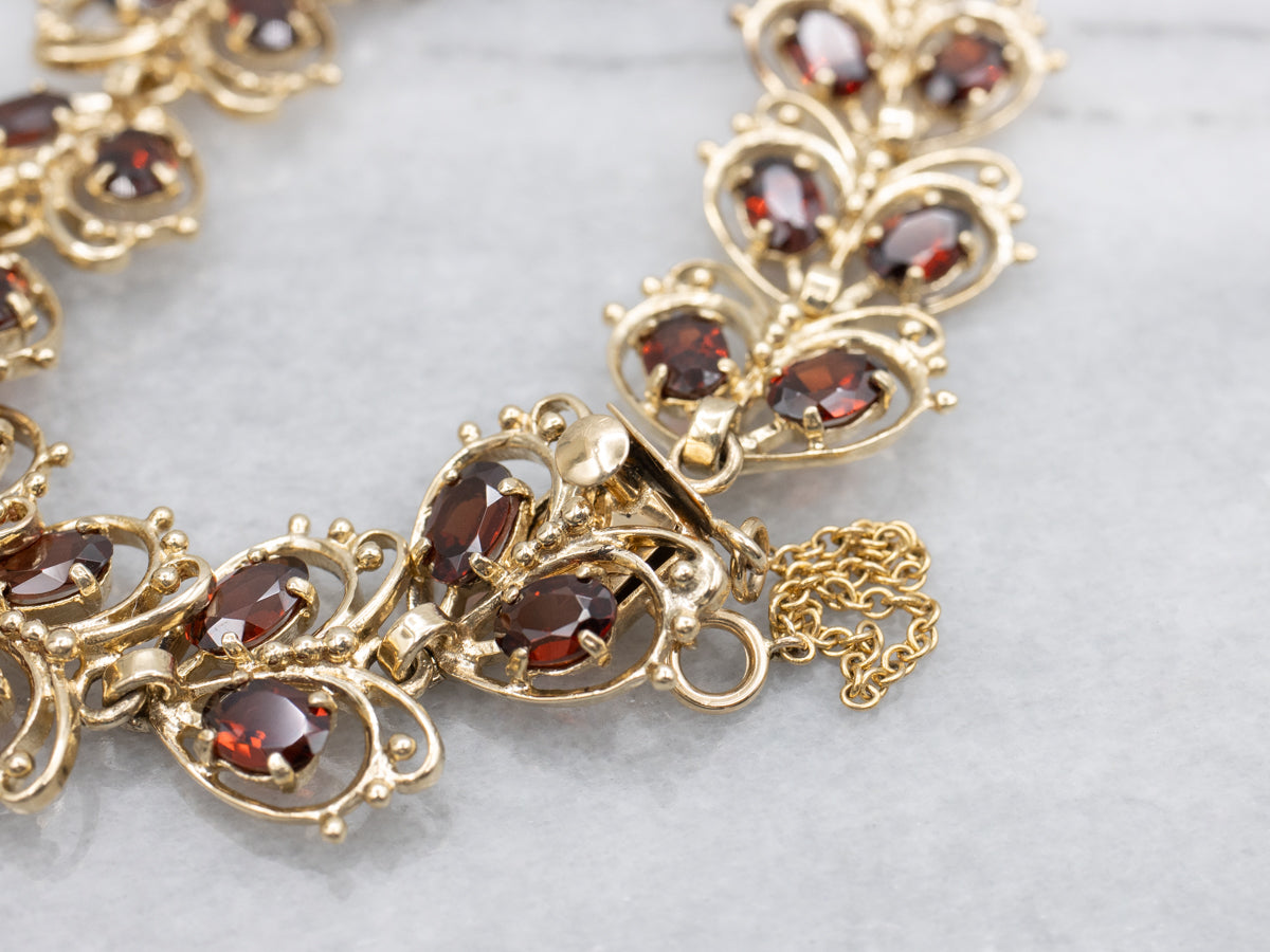 Looping Gold and Garnet Butterfly Link Bracelet
