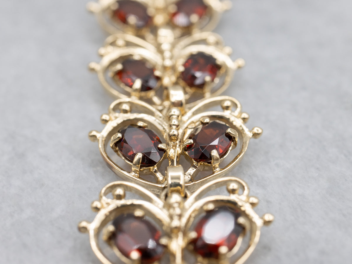 Looping Gold and Garnet Butterfly Link Bracelet