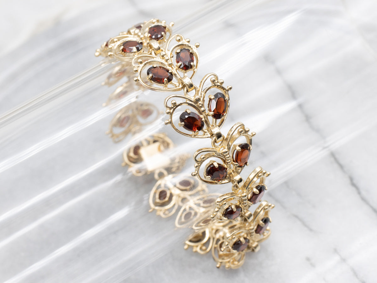 Looping Gold and Garnet Butterfly Link Bracelet