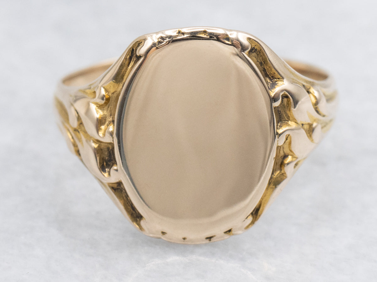 Vintage Oval Top Signet Ring with Decorated Shoulders