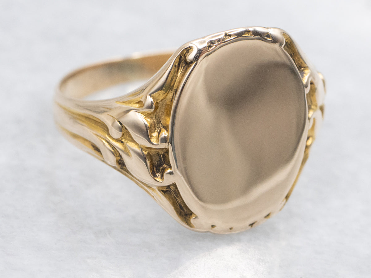 Vintage Oval Top Signet Ring with Decorated Shoulders