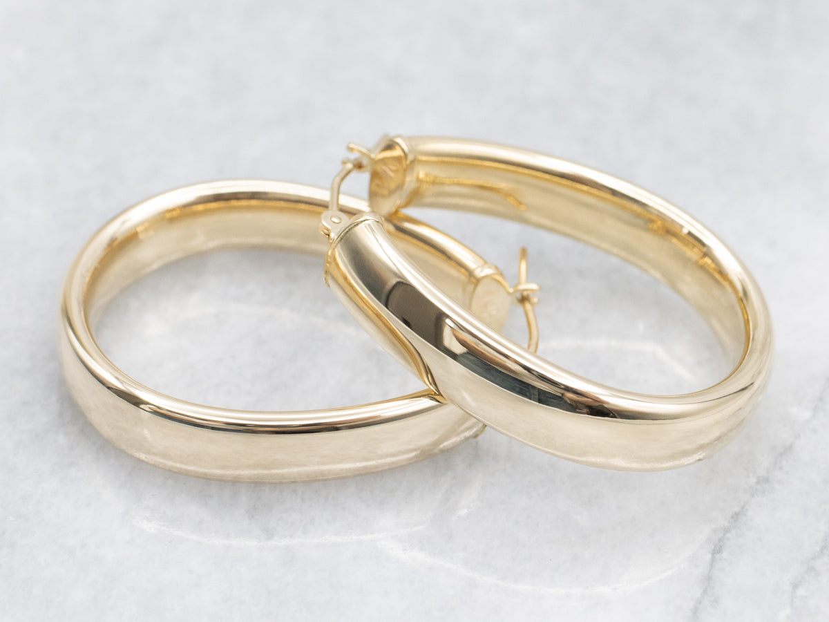 Wide Polished Gold Oval Hoop Earrings