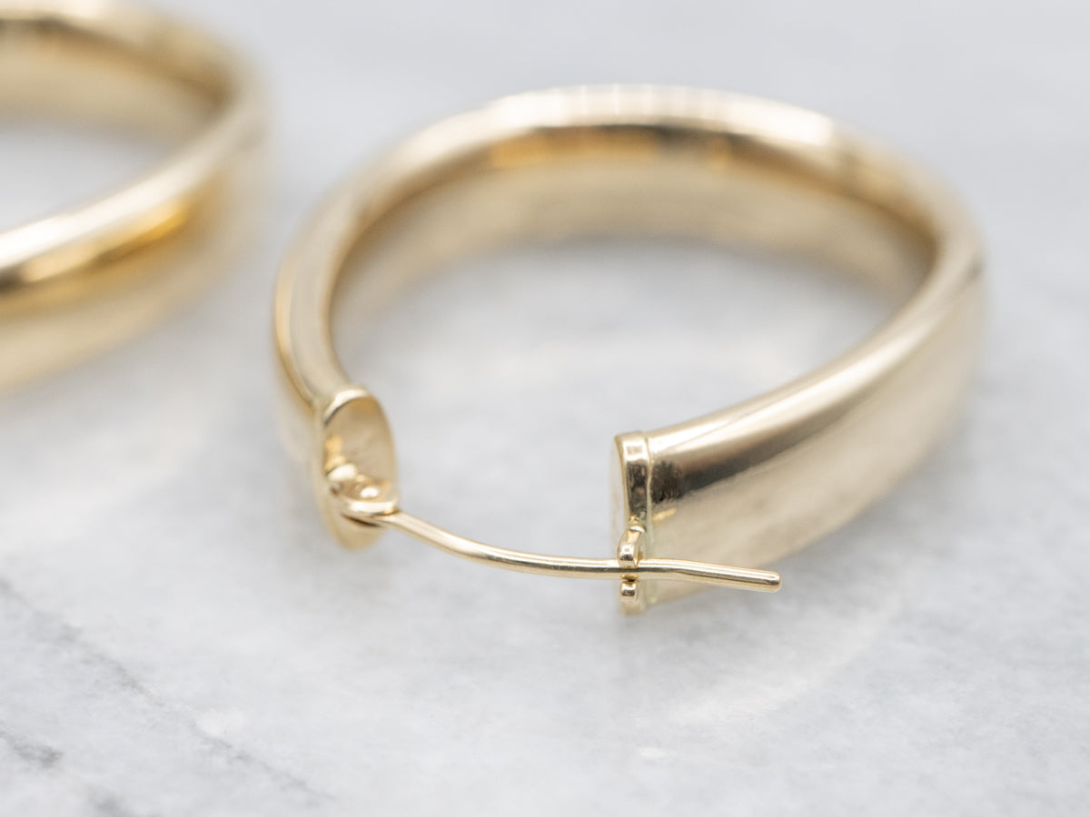 Wide Polished Gold Oval Hoop Earrings