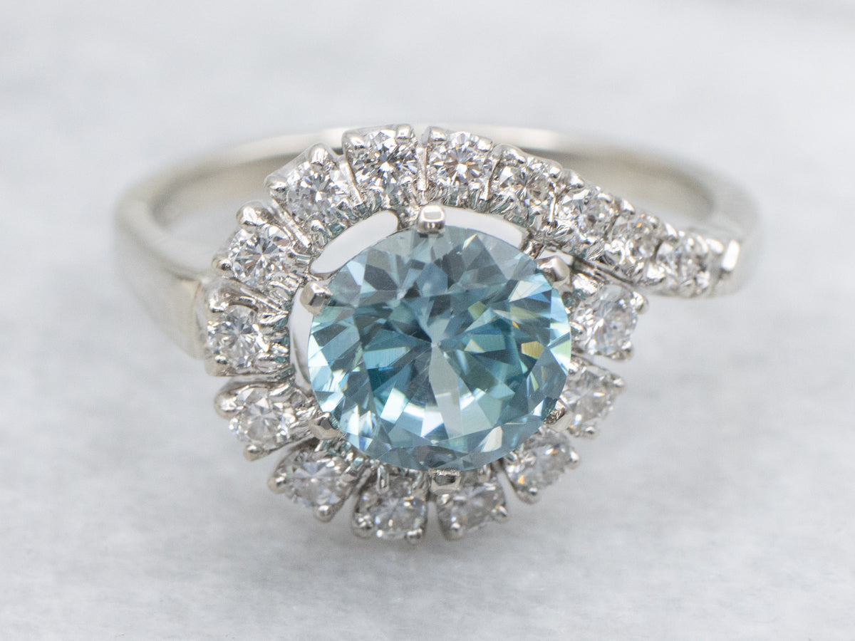 Blue Zircon and Diamond Bypass Ring