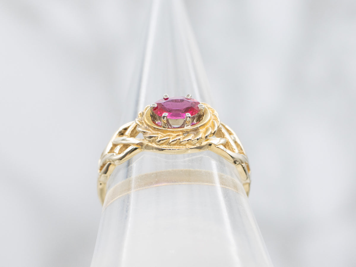 Unique Twisting Ruby Solitaire Ring with Openwork Knot Shoulders
