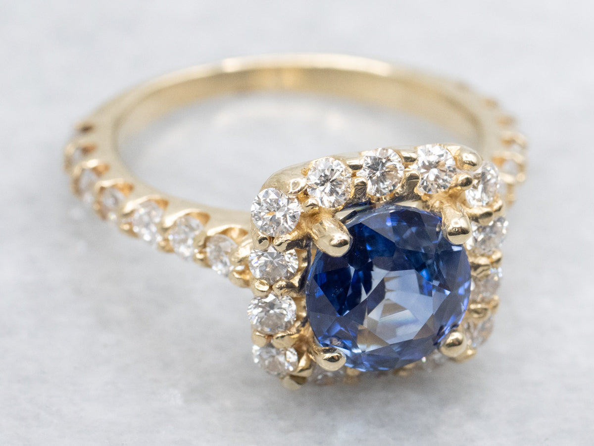 Modern Sapphire and Gold Halo Ring