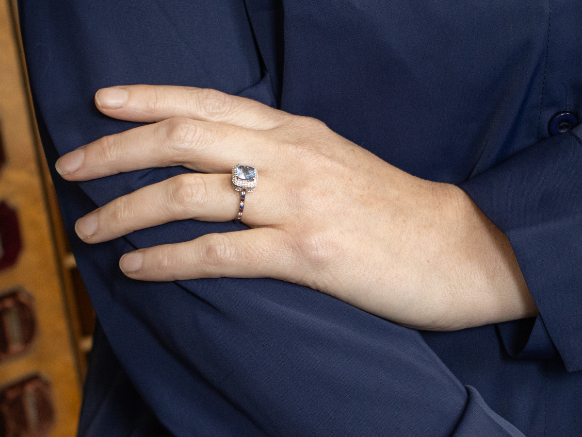 Modern Sapphire Halo Ring with Sapphire Diamond and Ruby Shoulders