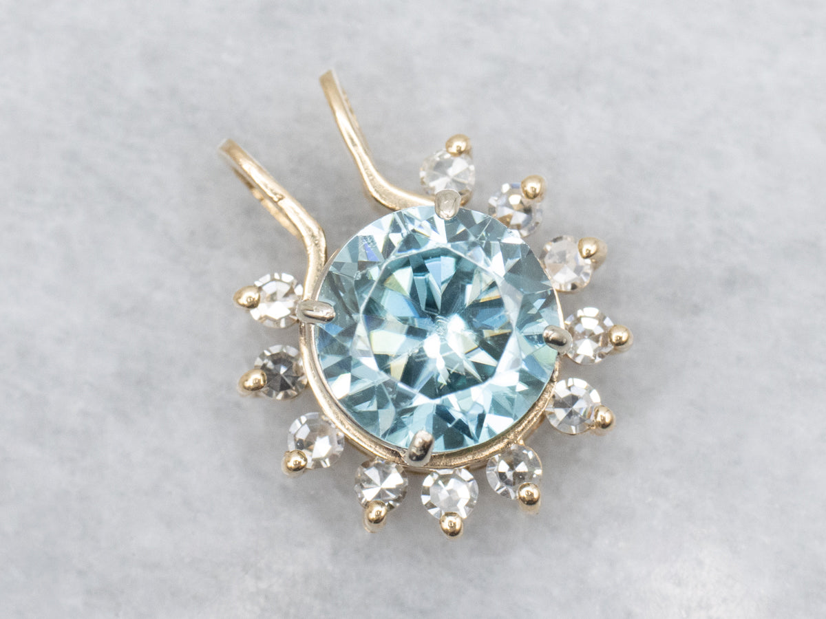 Icy Blue Zircon and Diamond Halo Pendant