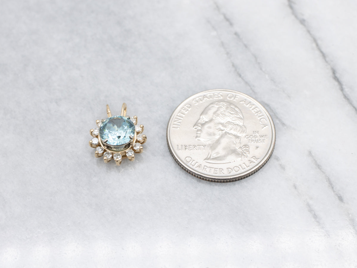 Icy Blue Zircon and Diamond Halo Pendant