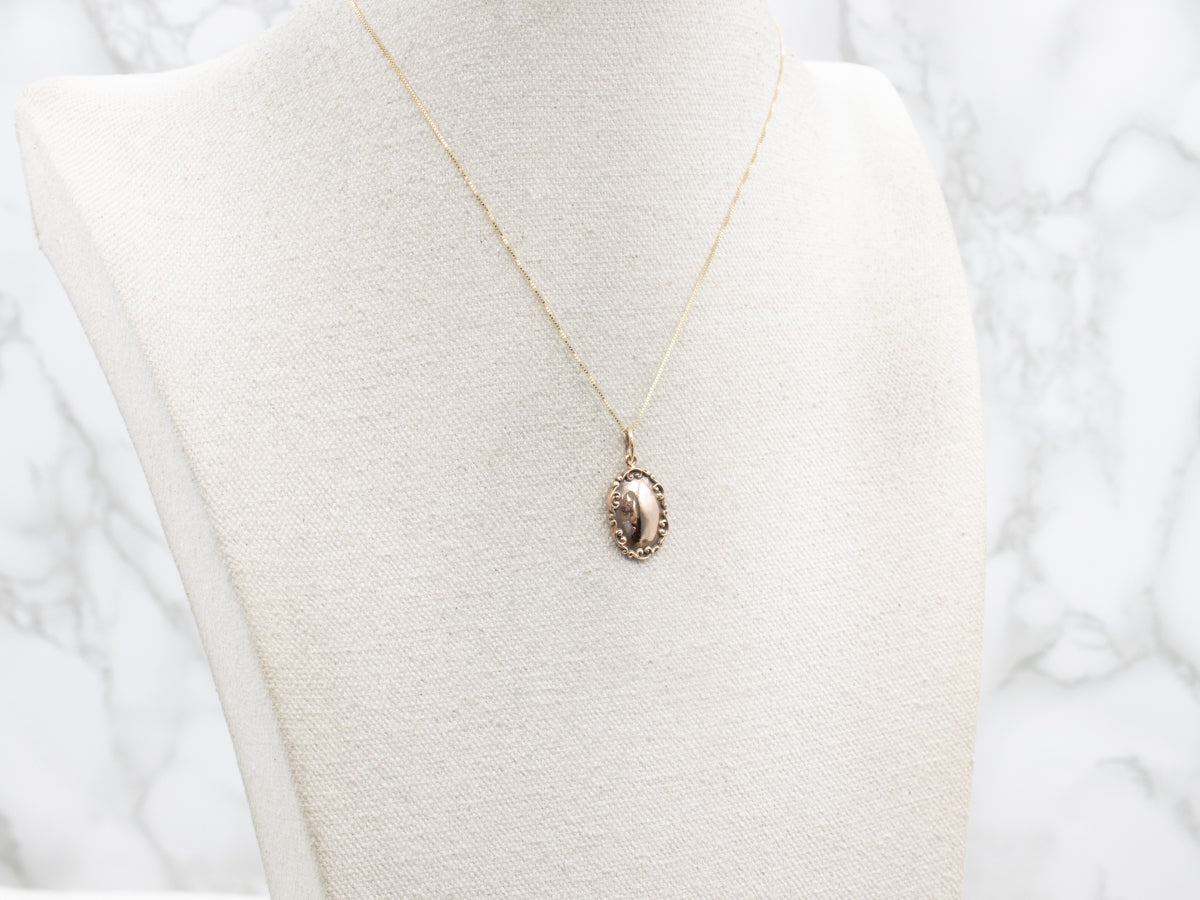 Scrolling Gold Signet Pendant