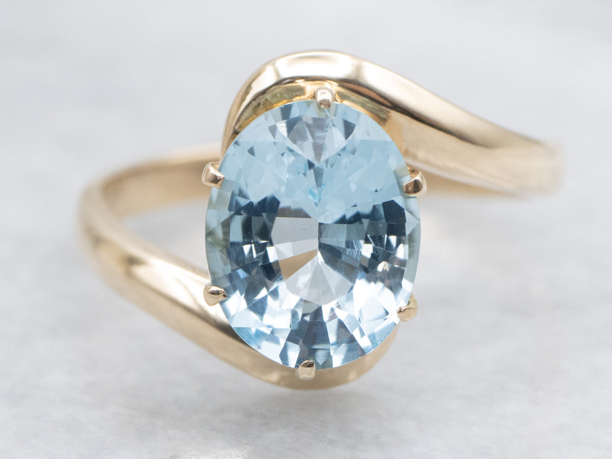 Blue Topaz Solitaire Bypass Ring