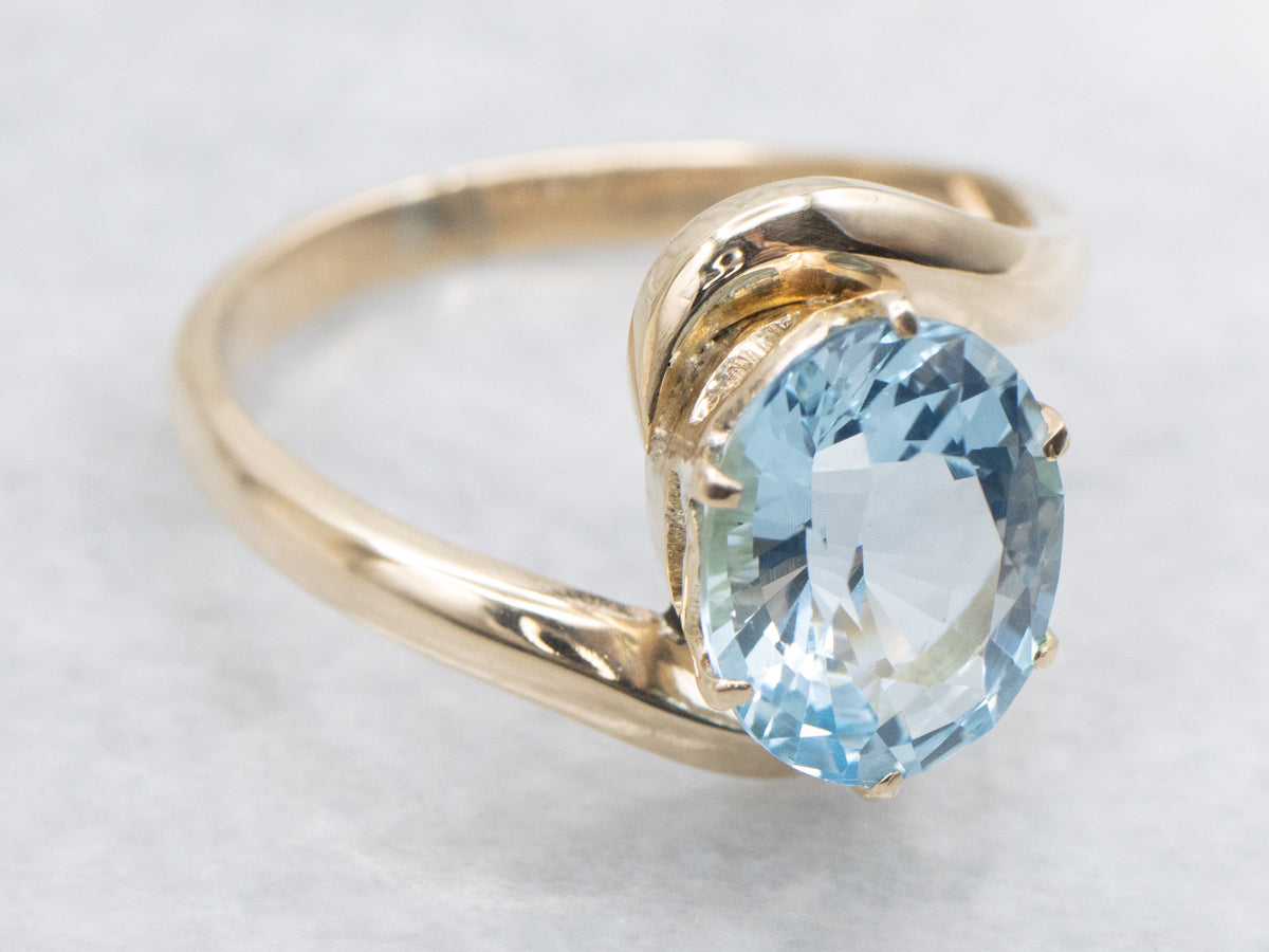 Blue Topaz Solitaire Bypass Ring