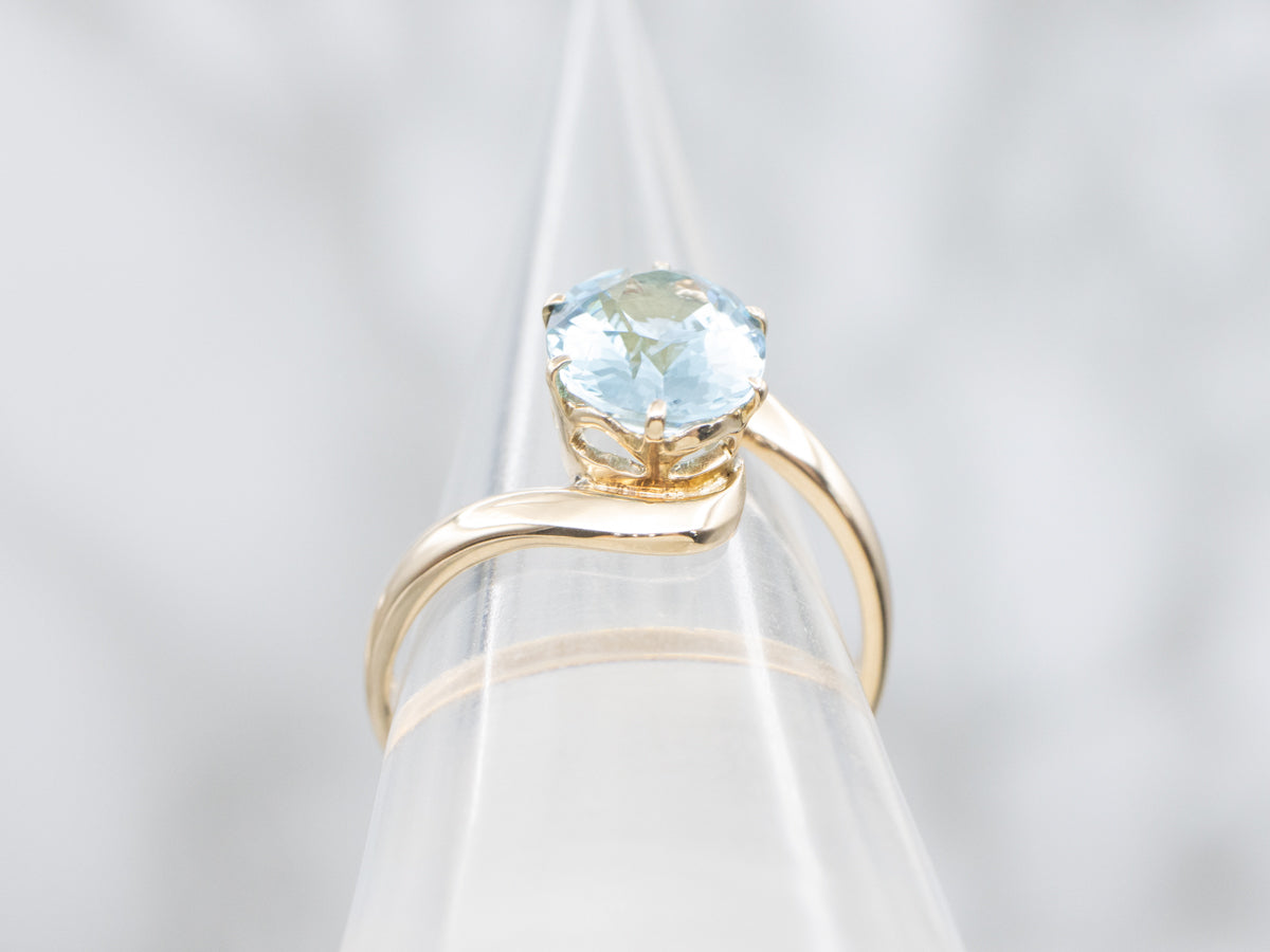 Blue Topaz Solitaire Bypass Ring