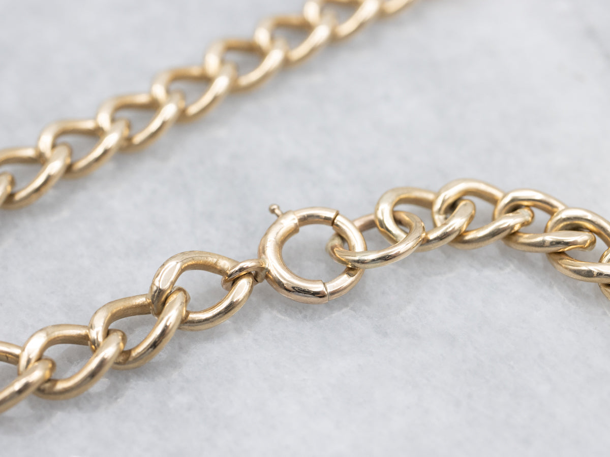 Polished Gold Curb-Link Bracelet with Spring Clasp