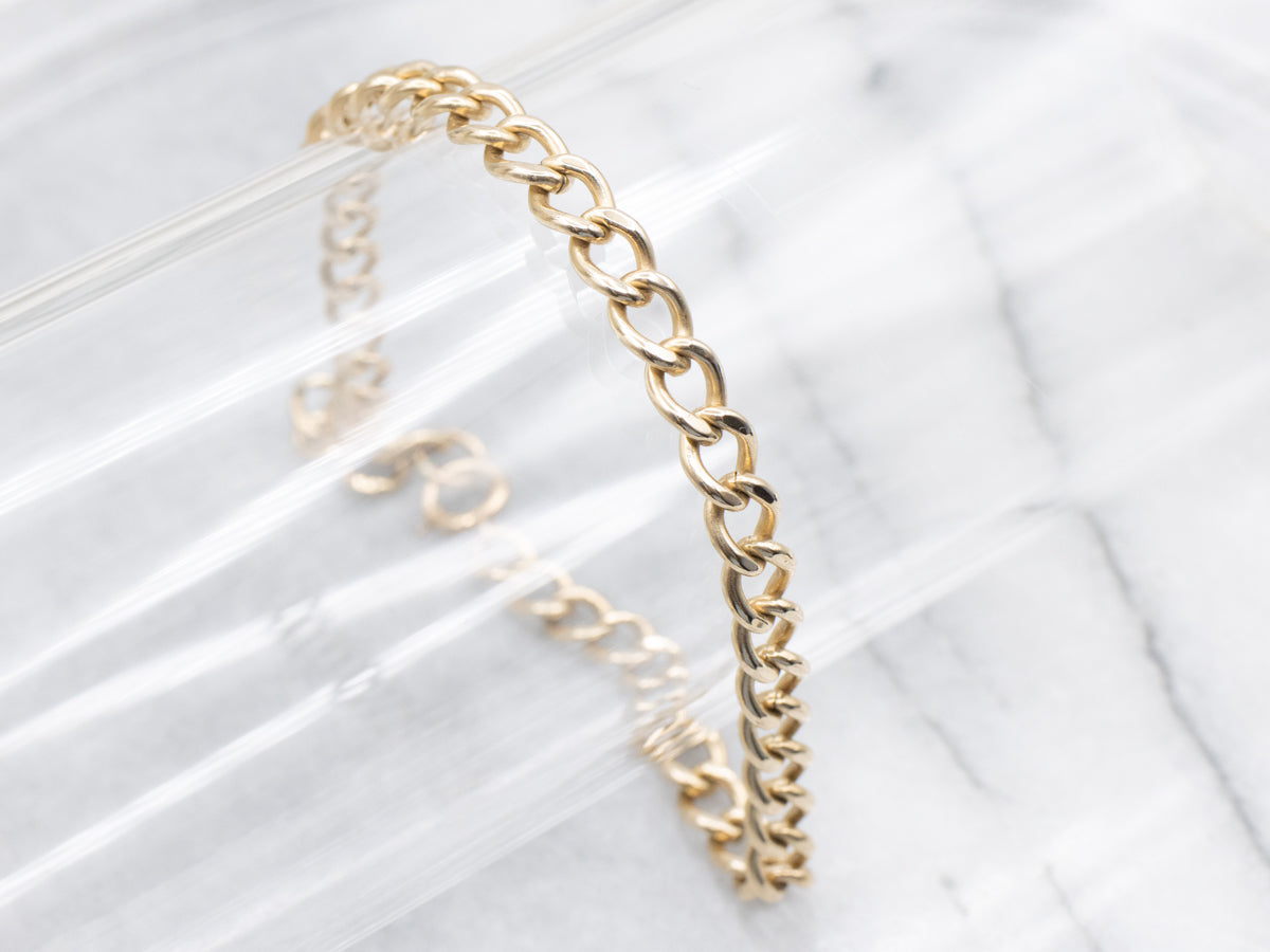 Polished Gold Curb-Link Bracelet with Spring Clasp