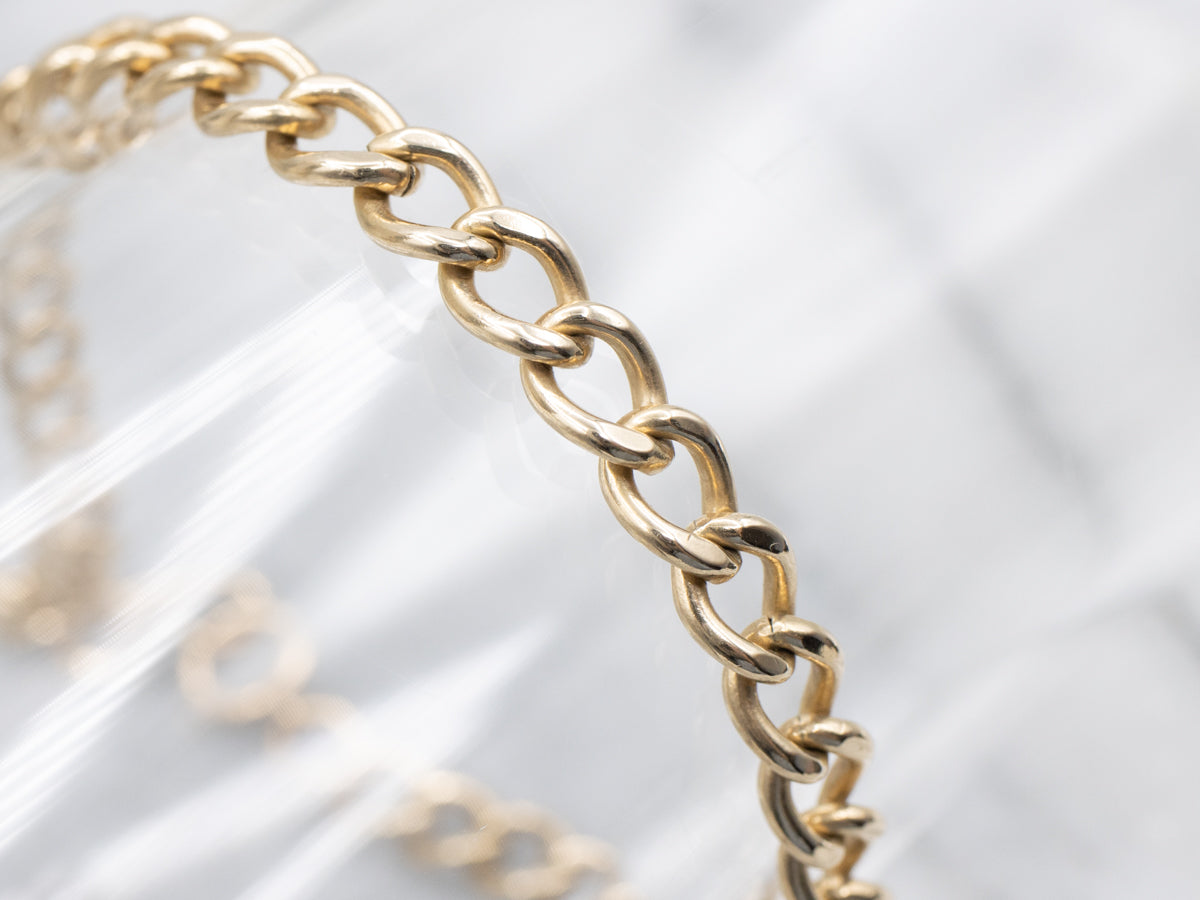 Polished Gold Curb-Link Bracelet with Spring Clasp