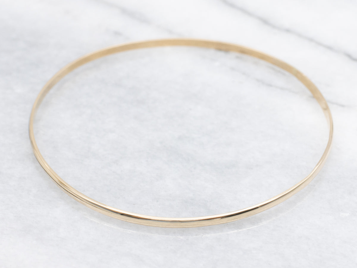 Sleek Polished Gold Bangle Bracelet