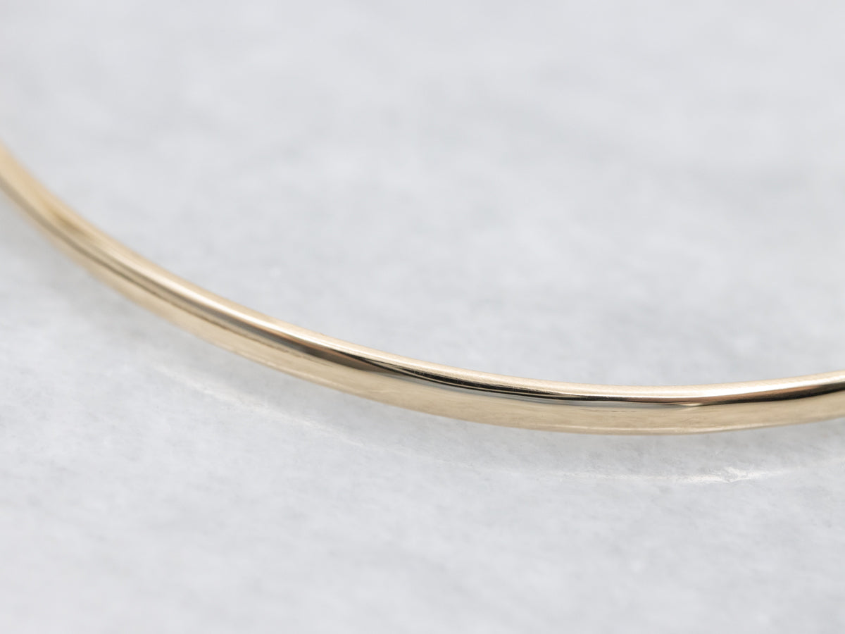 Sleek Polished Gold Bangle Bracelet