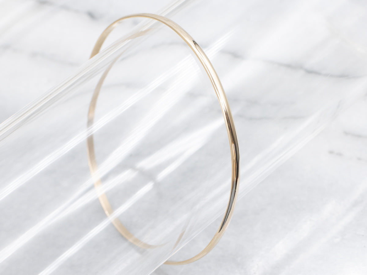Sleek Polished Gold Bangle Bracelet