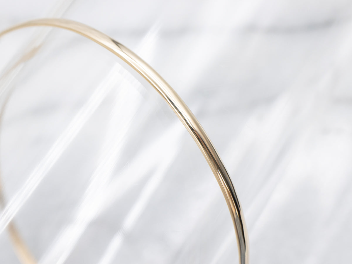 Sleek Polished Gold Bangle Bracelet