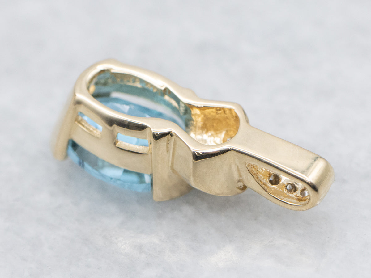 Modern Gold Blue Topaz and Diamond Pendant