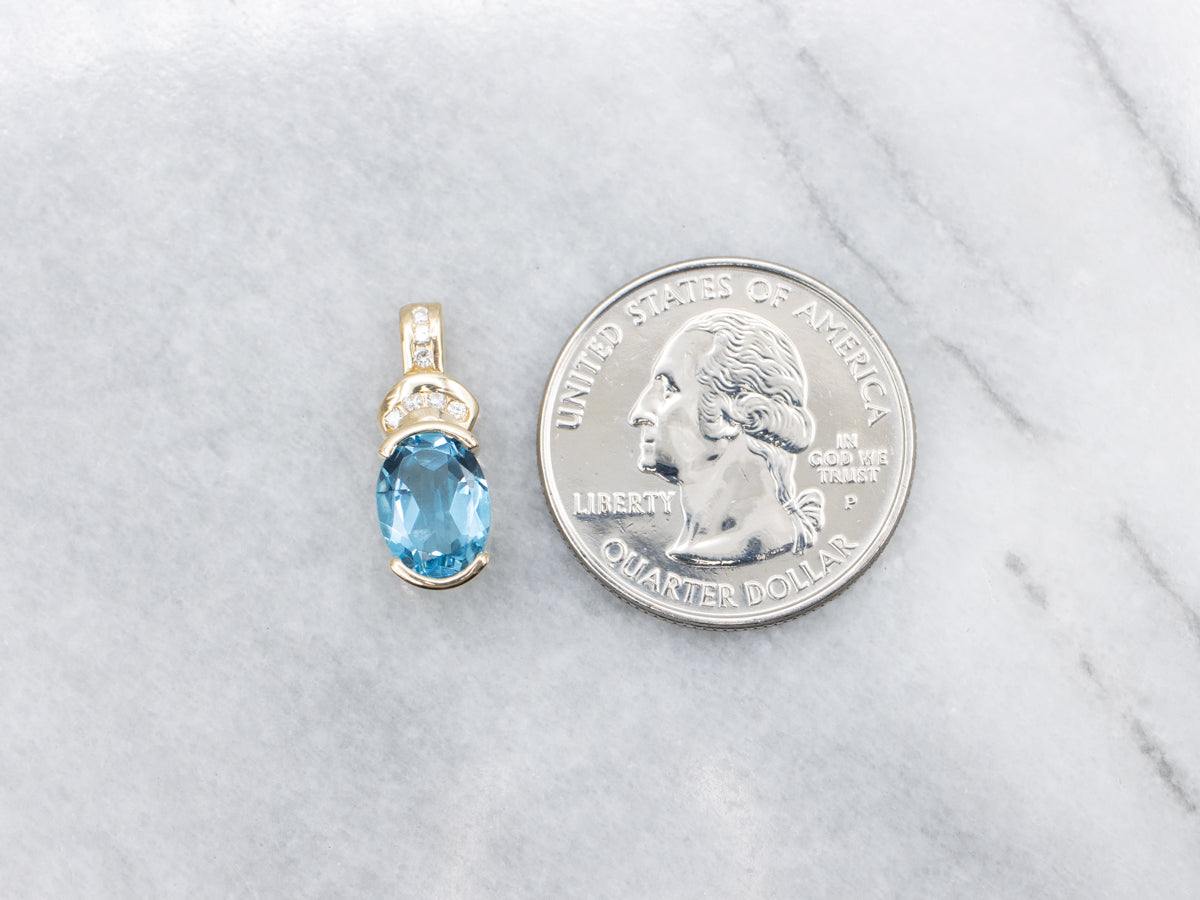 Modern Gold Blue Topaz and Diamond Pendant