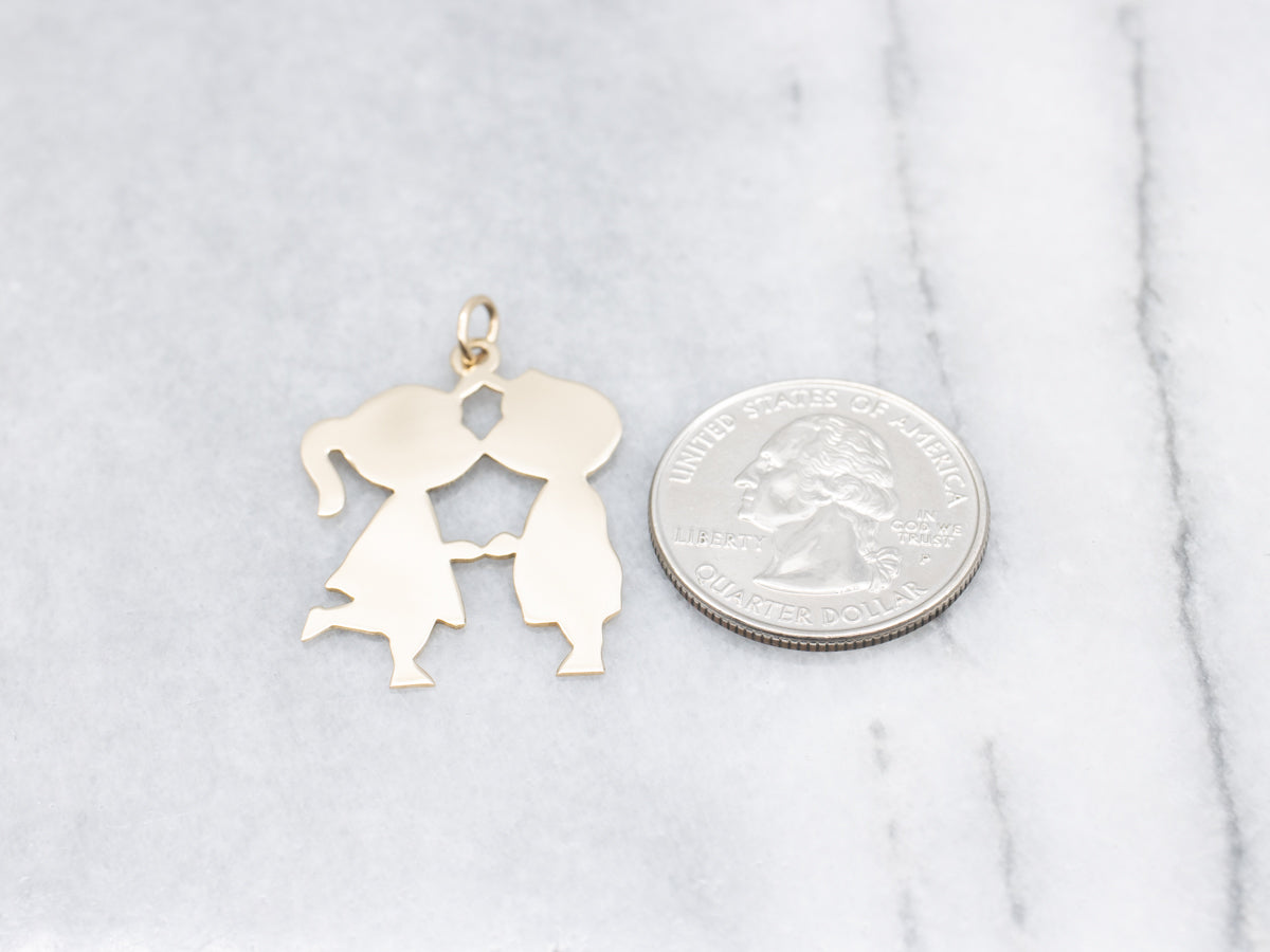 First Kiss Gold Silhouette Pendant