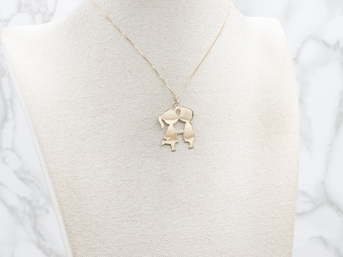 First Kiss Gold Silhouette Pendant