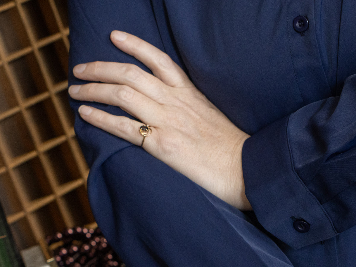 Swirling Garnet and Diamond Gold Ring