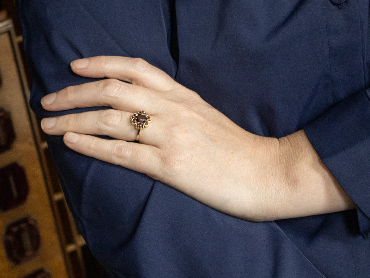 Ornate Twisting Gold Garnet Ring