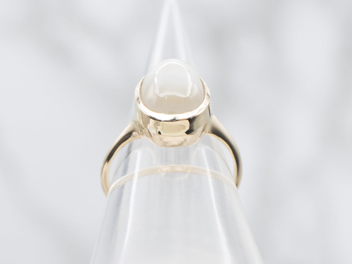 Minimalist Bezel Set Moonstone Ring in Yellow Gold