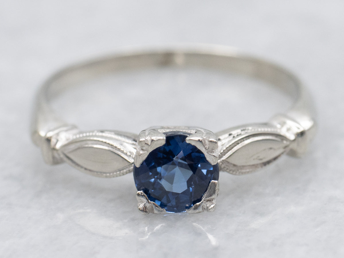 Vintage Blue Sapphire Gold Engagement Ring with Decorated Shoulders