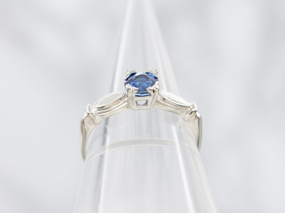 Vintage Blue Sapphire Gold Engagement Ring with Decorated Shoulders