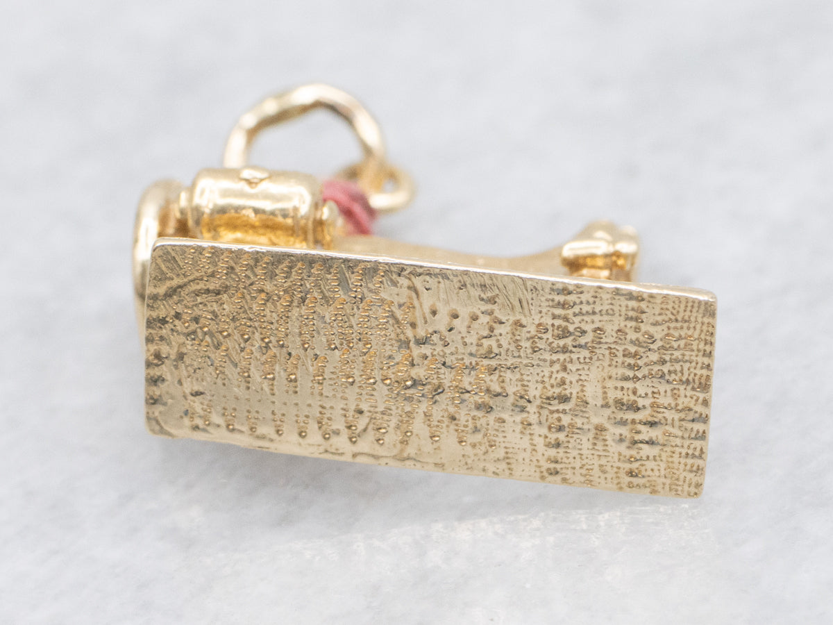 Vintage Gold Sewing Machine Pendant with Thread