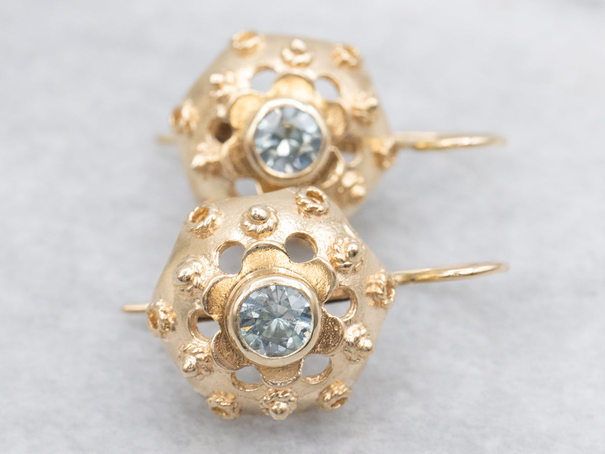 Golden Bezel-Set Blue Zircon Floral Drop Earrings