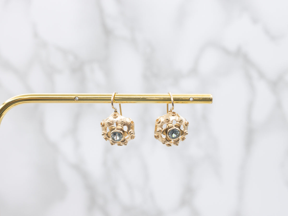 Golden Bezel-Set Blue Zircon Floral Drop Earrings